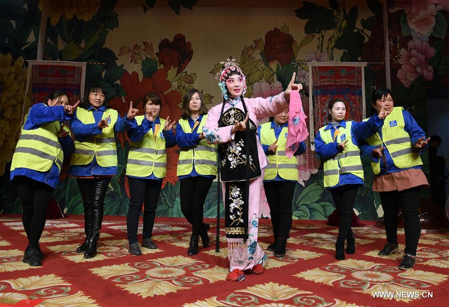 CHINA-BEIJING-PEKING OPERA-WOMEN'S DAY-WORKER-VISIT (CN)