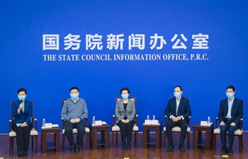 Experts attend video press conference in Wuhan